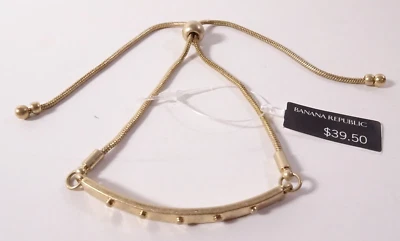 Brazalete deslizante Banana Republic dorado metálico para mujer nuevo con etiquetas 39,50 Foto 1 de 4