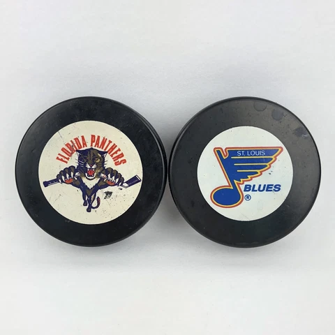 Vintage St. Louis Blues and Florida Panthers NHL Hockey Pucks InGlasCo Corp. LTD Cover