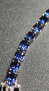 Oval Lab Created Blue Sapphire Rhodium over Sterling Tennis Bracelet | 18.61CTW - Picture 1 of 4