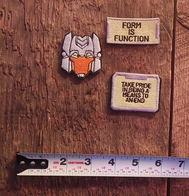 IDW Functionist Universe Propaganda + Brainstorm iron on patches lot 3 - Image 1 of 3