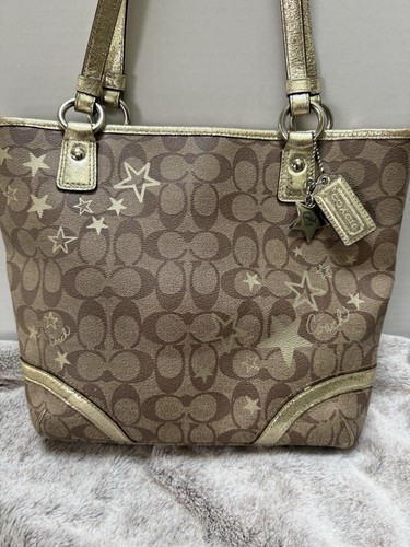 Borsa Coach beige oro firmata rivestita in tela e pelle Heritage Star