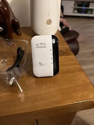 WiFi Signal Extender Internet Booster Range Repeater 300Mbps With Ethernet Port - Image 1 of 4