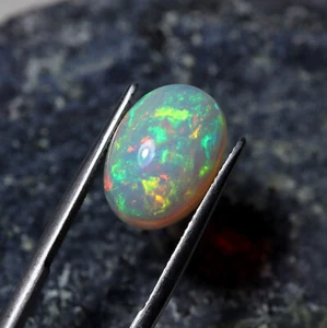 7.7 Cts 15.9x11.5x8.6 MM Natural AAA Green Red Fire Ethiopian Opal Oval Cabochon - Picture 1 of 8