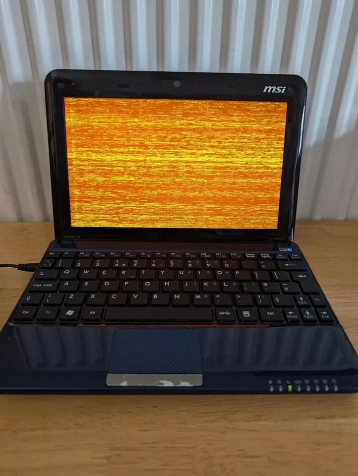 MSI Wind U135 Netbook Intel Atom 2GB RAM 160GB HDD Win 7  - For Spares Repair - Image 1 of 4