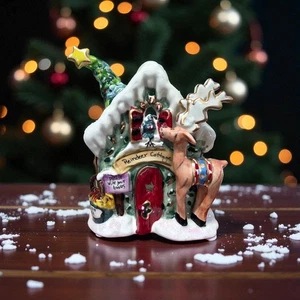 Casa delle candele casetta renne argilla cielo blu - Foto 1 di 5