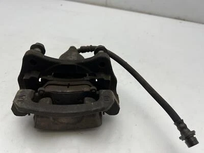 Pinza de freno trasera Toyota Sienna 2011-2014 con soporte lado del conductor izquierdo OEM Foto 1 de 4