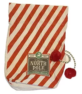 Bolsa de lona de Navidad - North Pole Trading Co. 20” X 14” X 4” rayas rojas brillantes - Imagen 1 de 6