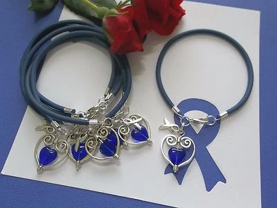 PULSERAS 'APOYO CON AMOR' CONCIENCIA SOBRE EL CÁNCER DE COLON - 6 UNIDADES  Foto 1 de 2