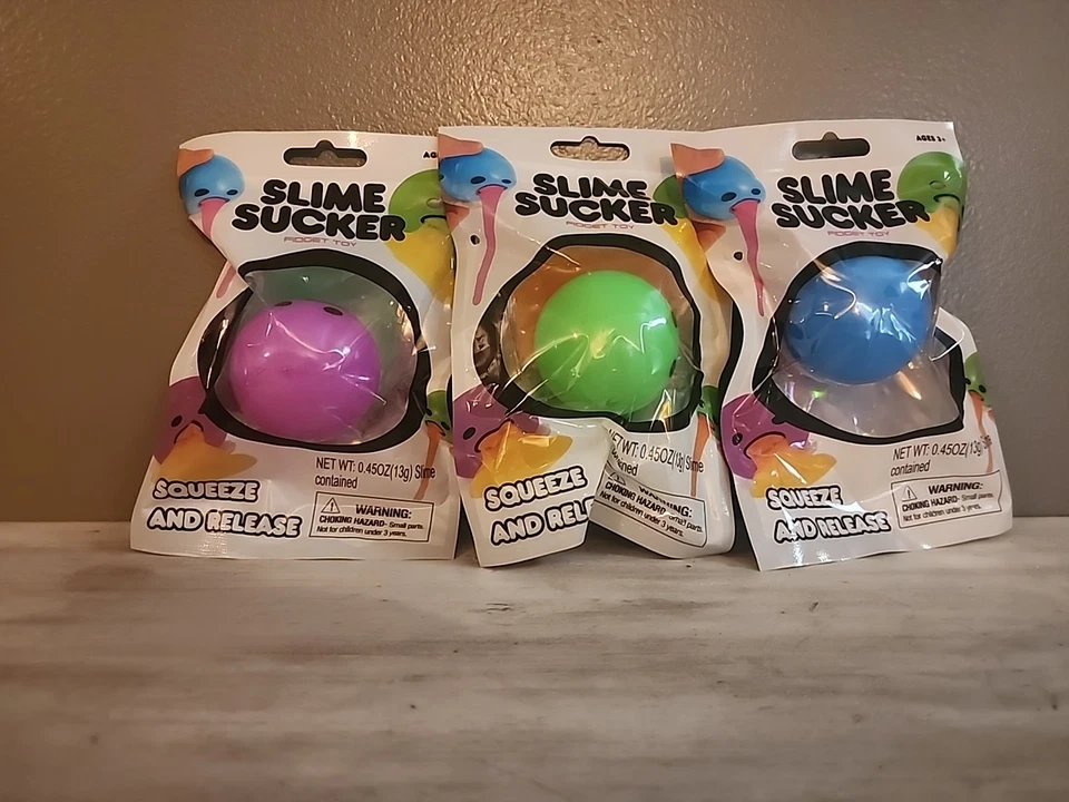 Succionador de limo nuevo. Verde, rosa y azul. Foto 1 de 1