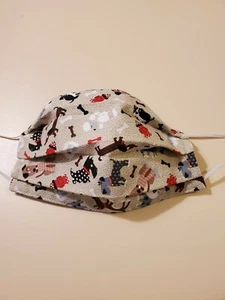 Mascarilla facial para adultos, hueso de perro, perros lindos, tela con estampado de lanzamiento, color beige - Imagen 1 de 2