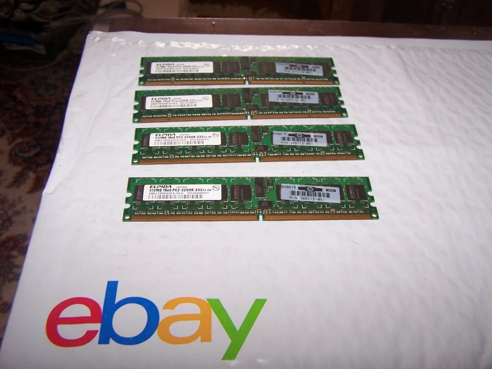 Set of Four ELPIDA 512MB (2GB Total) 1RX8 PC2-3200R-33 RAM  HP P/N 345112-051 - Image 1 of 1