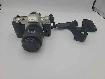 Cámara fotográfica Pentax ZX-10 35mm con lente con estuche. sin probar con correa ver desc. Foto 1 de 4
