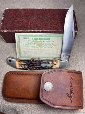 Schrade+ Uncle Henry USA 127UH Hunter Lockblade Folding Knife w/ Leather Sheath - Image 1 of 3