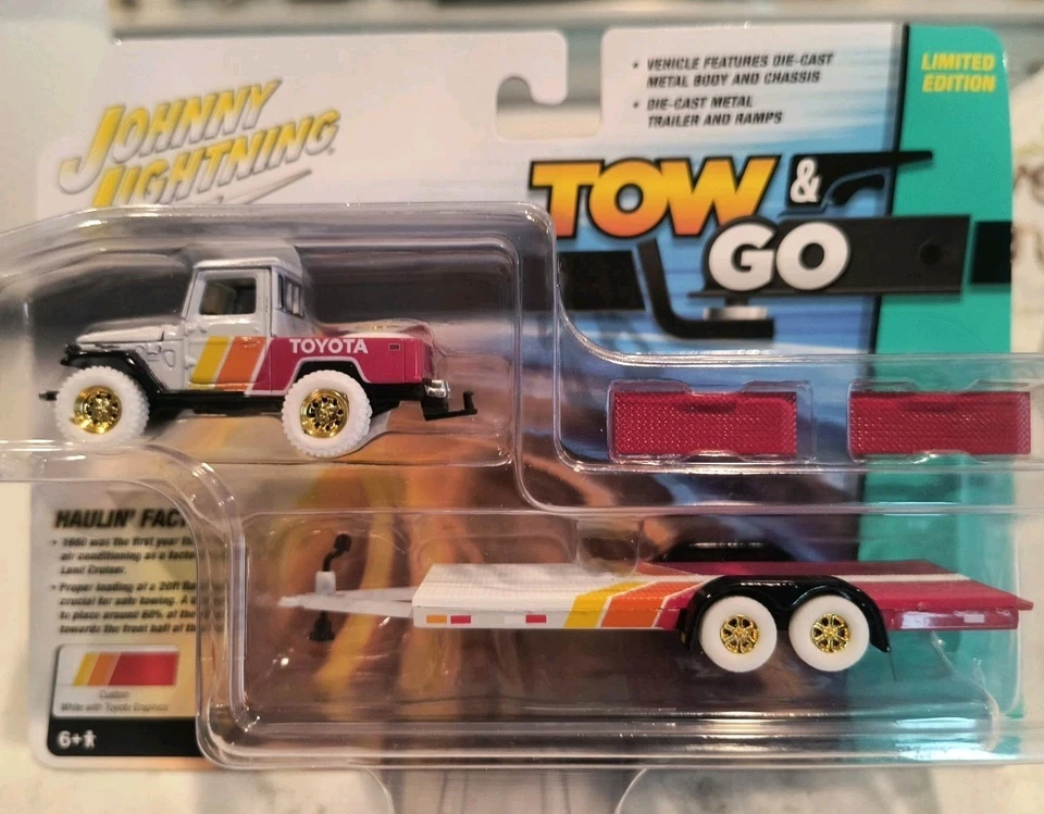 Johnny Lightning White Lighting 1980 Toyota Land Cruiser Flatbed Trailer Haulers - Image 1 of 4
