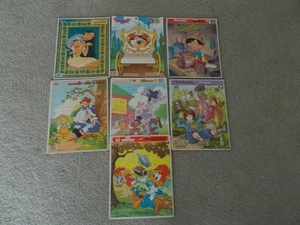 7 Vtg Frame Tray Puzzles Pinocchio Cinderella Pocahontas Pound Puppies Raggedy - Picture 1 of 1