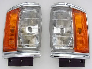 83 - 88 TOYOTA HILUX 2WD LN56 CHROME CORNER INDICATOR LIGHT PAIR - Picture 1 of 1
