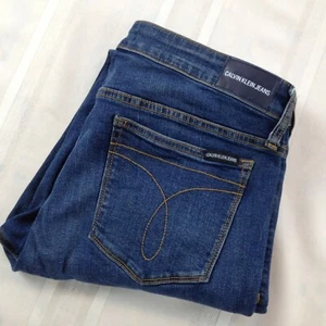 Calvin Klein Jeans Mid Rise Medium Wash Tapered Blue Denim Jeans Damen 31 x 30 - Bild 1 von 11