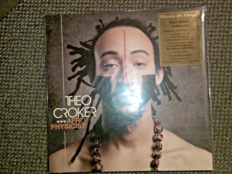 Theo Croker - AfroPhysicist  LIMITED ORANGE/WHITE MARBLED VINYL 2LPs NEU (2023) - Bild 1 von 1