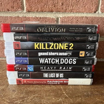 Lote de 8 Juegos PS3 GTA V Oblivion Heavy Rain Killzone 2 Shadow Mordor Watch Dogs Foto 1 de 4