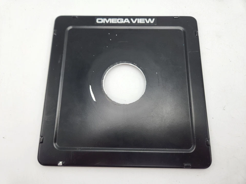 Placa de lente metálica Omega View 6 1/4" x 6 1/4" 158 mm cuadrada 42 mm con orificio Foto 1 de 4