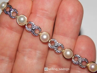 10K WHITE & YELLOW GOLD PEARL FIGURE EIGHT DIAMOND CUT TENNIS BRACELET 7.25 INCH - Image 1 of 4