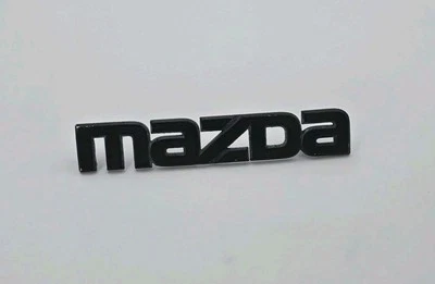 2004-2011 MAZDA RX8 RX-8 TAMPA TRASEIRA EMBLEMA LOGOTIPO EMBLEMA PLACA FABRICANTE DE EQUIPAMENTO ORIGINAL - Imagem 1 de 3