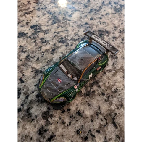 Disney's Pixar Cars 2 "Nigel Gearsley" World Grand Prix Die cast race car Green Cover