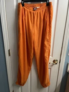 Pantalones deportivos vintage Nike Team naranja pista cortavientos calentamiento nailon para hombre talla XL - Imagen 1 de 7