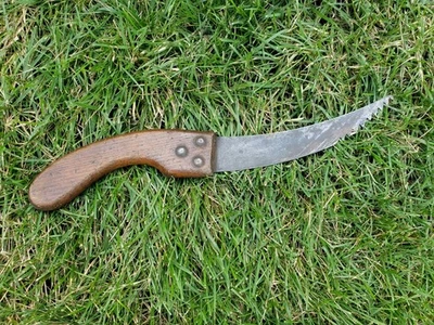 Antique Primitive Curved Cutting Tool with Saw Teeth and Wood Handle - Image 1 of 4