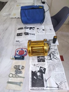 Carrete de arrastre PENN INTERNATIONAL II Gold con manual y herramientas incl... - Imagen 1 de 10