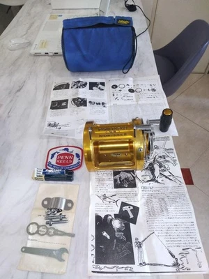 Carrete de arrastre PENN INTERNATIONAL II Gold con manual y herramientas incl... - Imagen 1 de 4