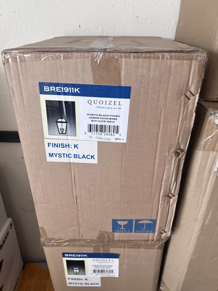 Colgante exterior Quoizel Black Ridge 3 luces 11" de ancho con pantalla de vidrio BRE1911K Foto 1 de 1