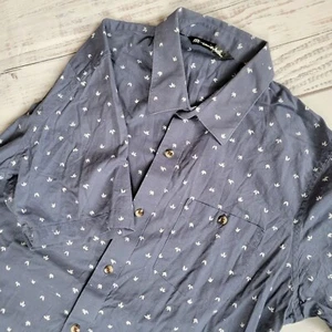 Camisa informal Travis Mathew abotonada para hombre azul medio manga corta mezcla de algodón - Imagen 1 de 9