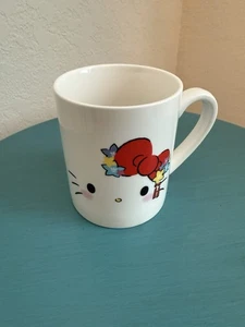 Hello Kitty Sanrio Becher Rot Schleife Sterne Japan Text Keramiktasse Mikrowellengeeignet - Bild 1 von 4