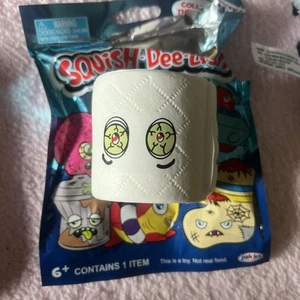 Squish Dee Lish Wacky Serie 1 Carta Igienica Bianca Slow Rise Squeeze NUOVO - Foto 1 di 2