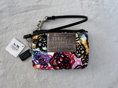 Muñequera Coach Poppy Graffiti Blossom 44218 nueva con etiquetas Foto 1 de 4