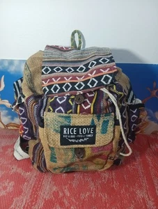 Rice Love Handmade Recycled Rucksack - Feed a Family - Guter gebrauchter Zustand B1 - Bild 1 von 10