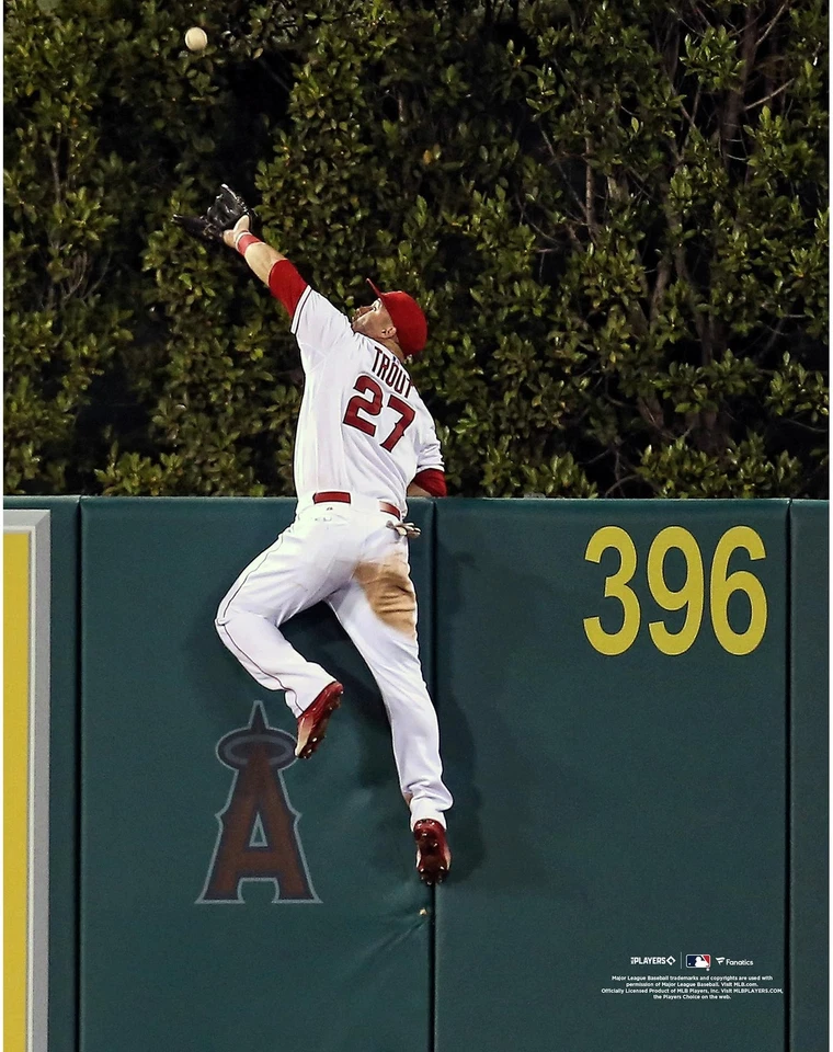 Mike Trout Los Angeles Angels Unsigned Wall Catch Photo - Image 1 of 1