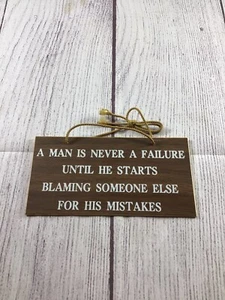 Vintage Man Is Never A Failure Plastic Woodgrain Sign - Picture 1 of 7
