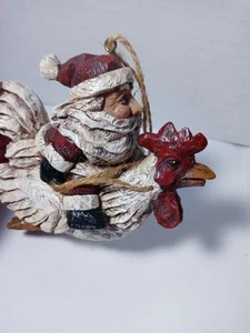 Weihnachtsmann reitet auf einem Hahn Huhn Weihnachtsschmuck - Bild 1 von 6