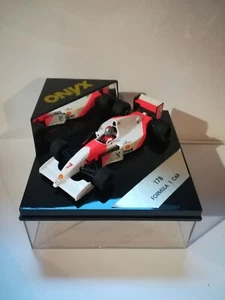 F1 Onyx Formula 1 Car #7 1/43 - Foto 1 di 13