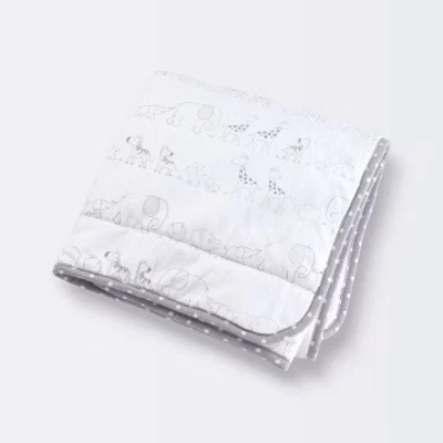 Manta reversible tejida Jersey dos por dos - gris Cloud Island Foto 1 de 4