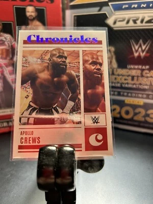 APOLLO CREWS: 2023 Panini Chronicles WWE🔥#/349 PINK🔥Parallel Raw #3 - Image 1 of 4