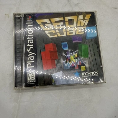 Geom Cube (Sony PlayStation 1, 1996) PS1 Complete w/Manual. Minor Moisture Damag - Image 1 of 4