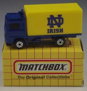 MATCHBOX VOLVO CONTAINER TRUCK MB-23 NOTRE DAME IRISH FOOTBALL 1/64 SCALE NIB - Picture 1 of 7