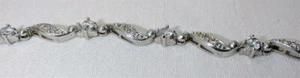 Ladylike Glitz Bracelet in Silver Tone with Crystal Clear Stones Locking Closure - Picture 1 of 3