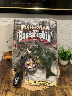 Pesca de lubina Fish or Man de Radica Games Head 2 cabezas Fishin Hank Parker NUEVO Foto 1 de 4