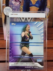 2021 Topps WWE Women’s Division Asuka Earns Smackdown Championship - Purple /99 - Picture 1 of 3