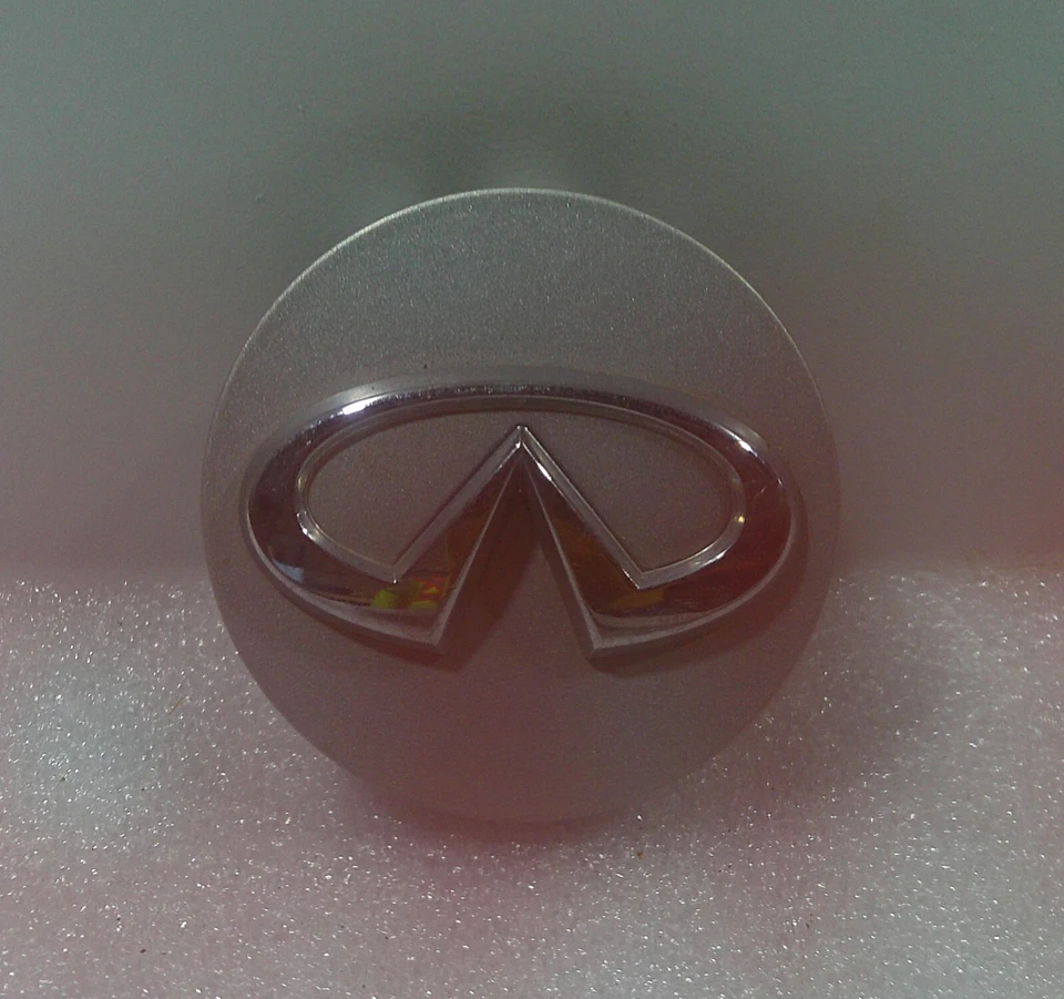 98-08 INFINITI G35 Q45 I30 G20 M45 OEM TAPA CENTRAL PLATEADA P/N # 40342-AU510 Foto 1 de 1