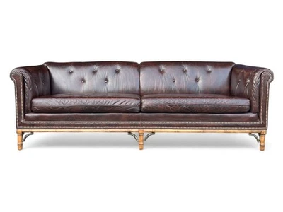 Sofá vintage de cuero marrón oscuro con base de bambú y seis patas de madera tallada Foto 1 de 4